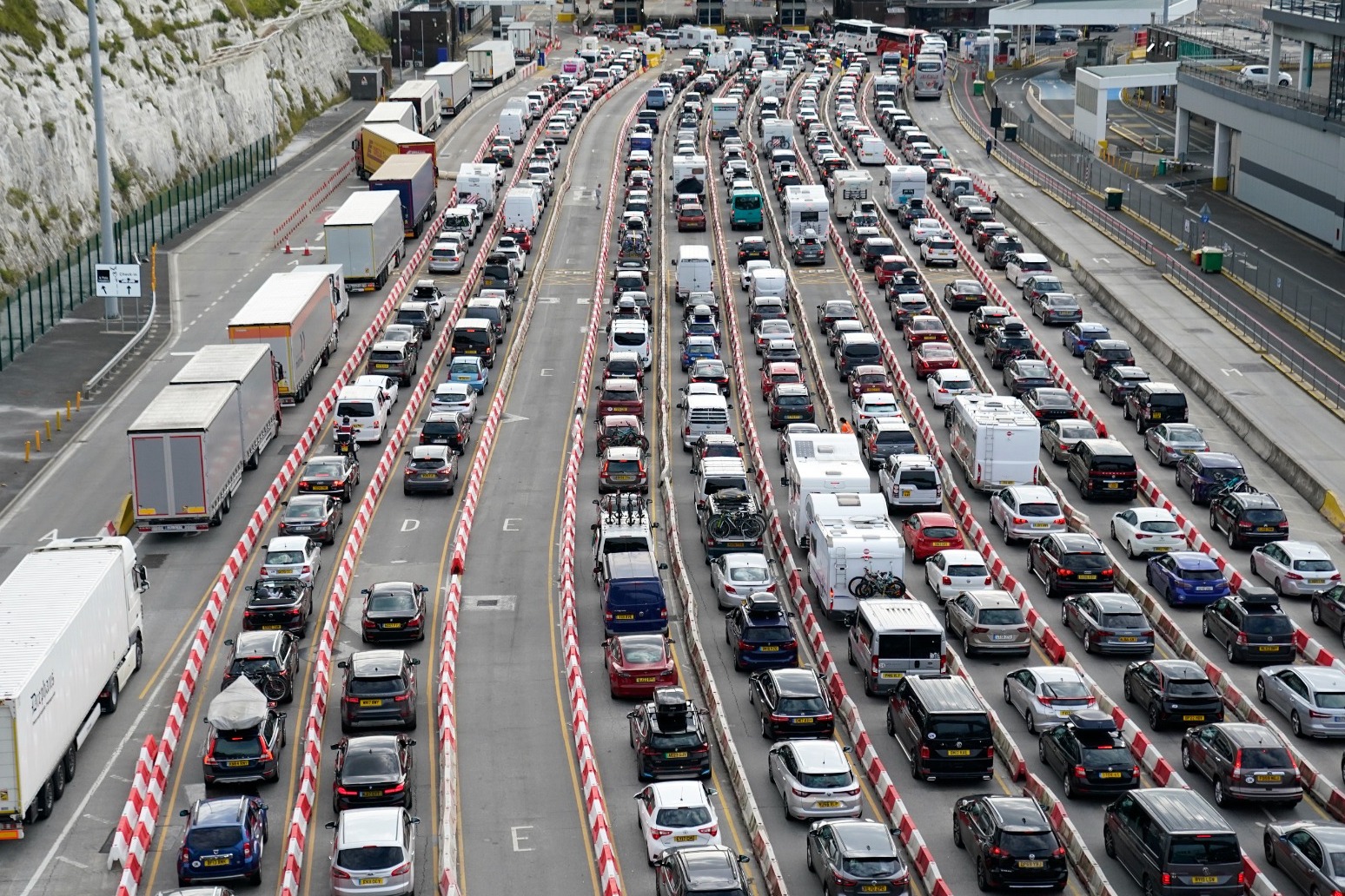 Ferry queues and rail strikes hit start of summer holidays 