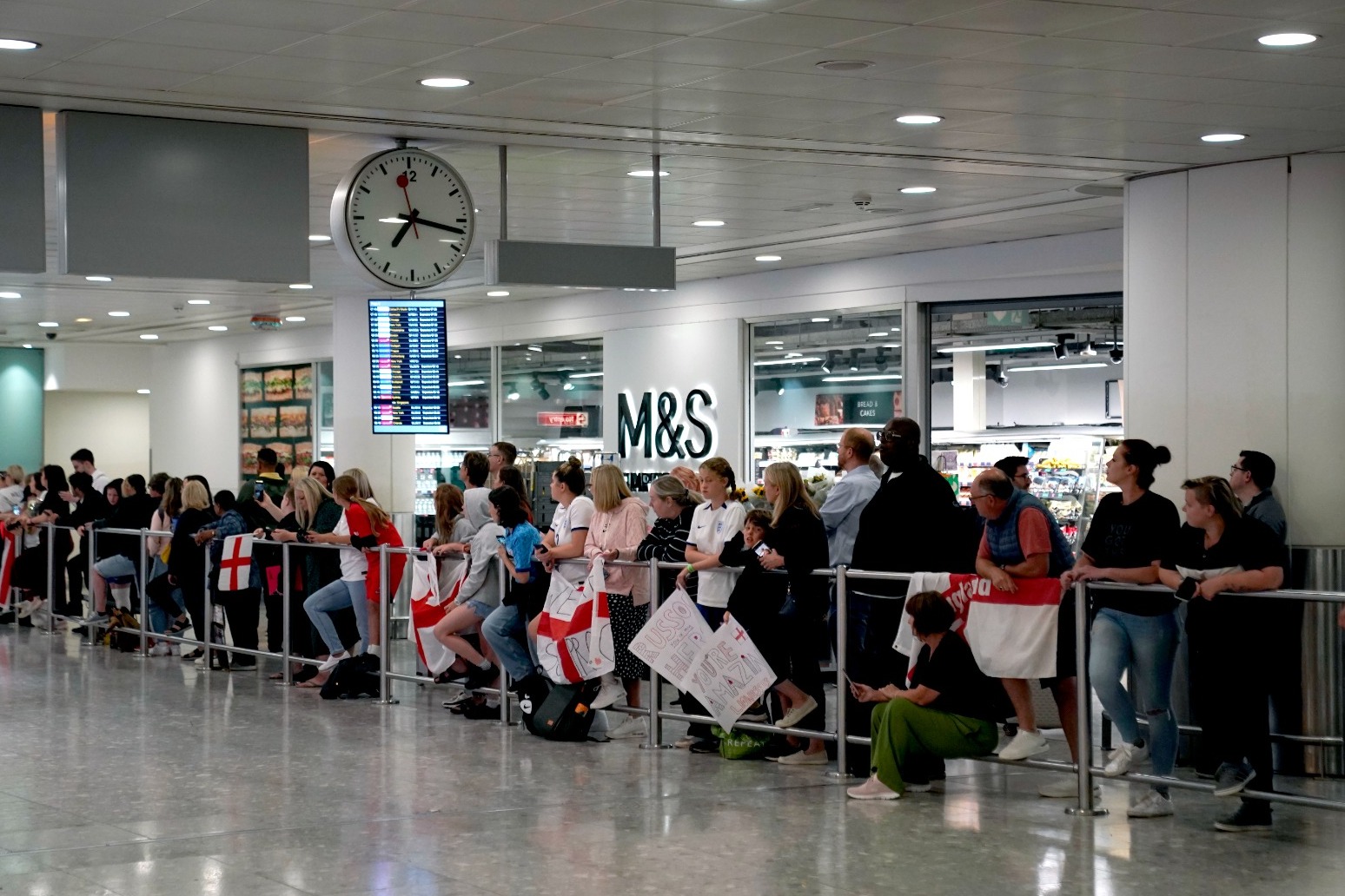 Fans miss out on welcoming Lionesses as World Cup squad lands back in UK 