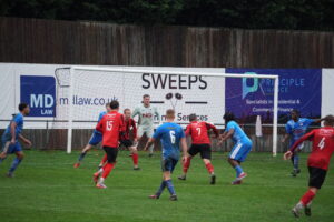 Dronfield battle back for a point in stormy conditions against Radford